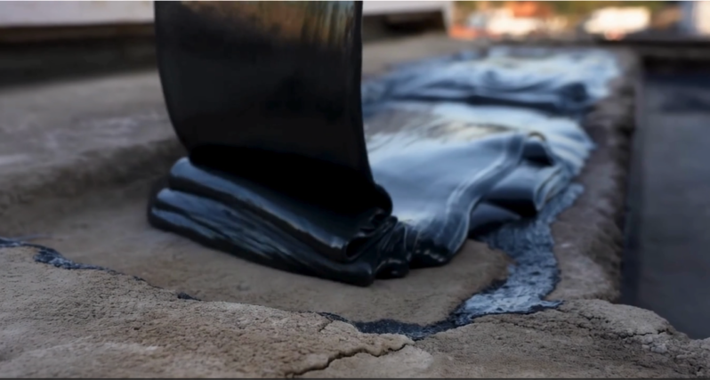 Liquid rubber waterproof coating applied to concrete structure