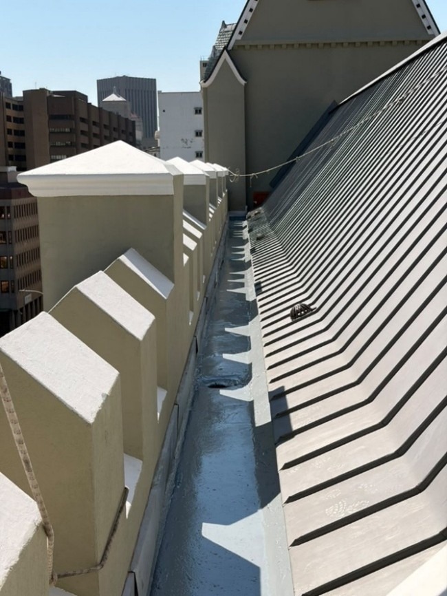 Completed waterproofing of wooden box gutters at a Cape Town cathedral